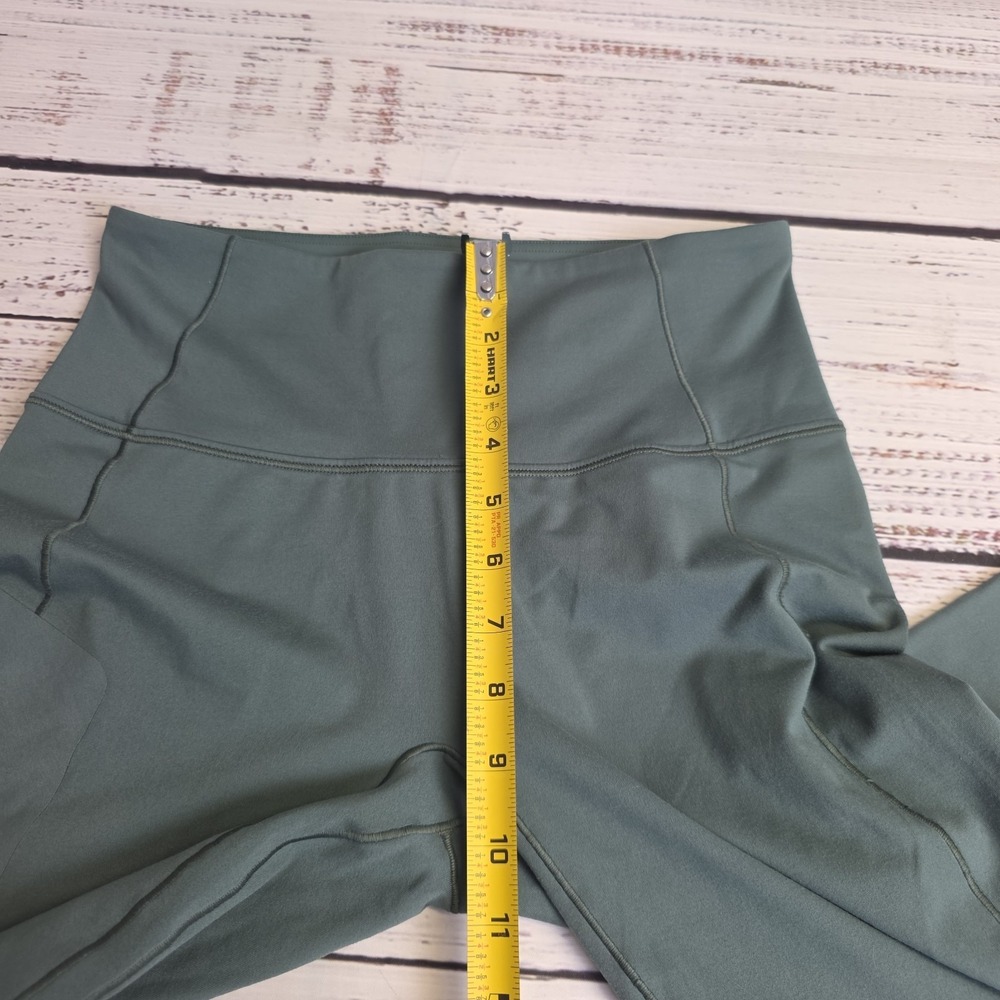 Arc'teryx Rho Bottom Women Medium Teal Green Zip Side Pocket Base Layer Outdoors - Picture 8 of 9